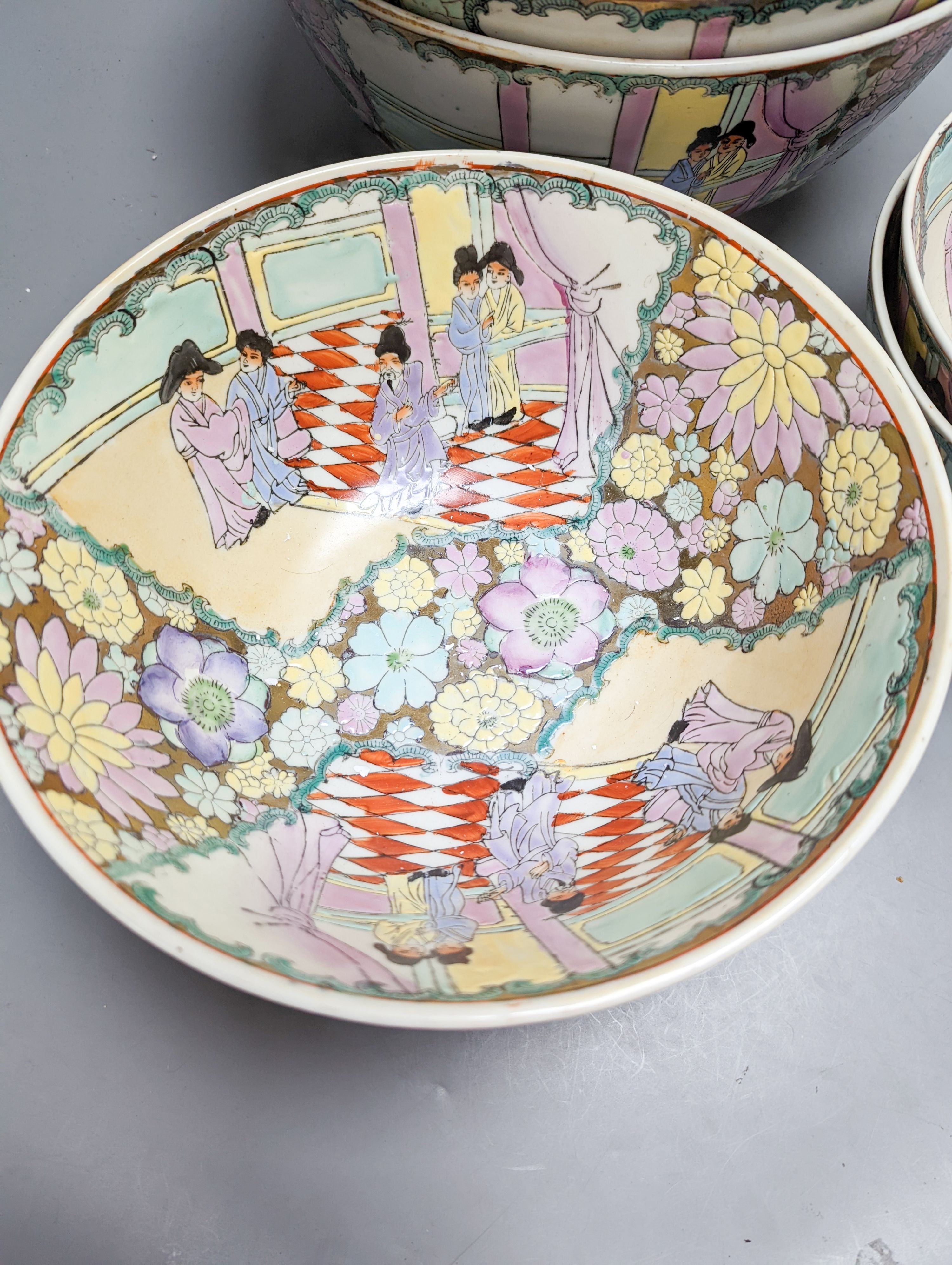 A set of six Chinese famille rose graduated bowls and a scroll picture